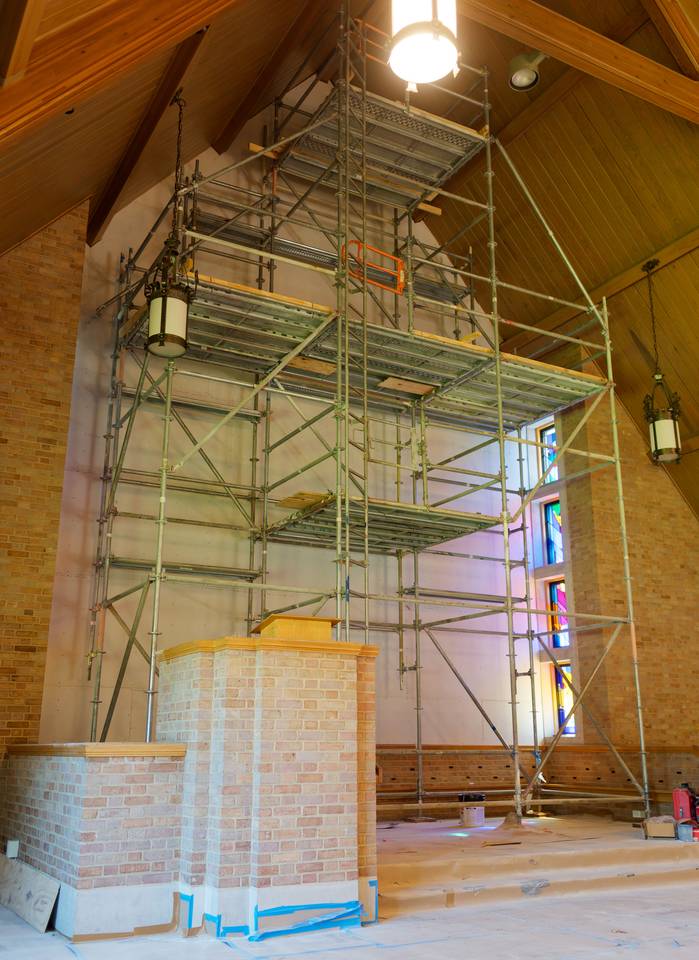 Tectum panels behind the altar wall have been removed and sheetrock installed